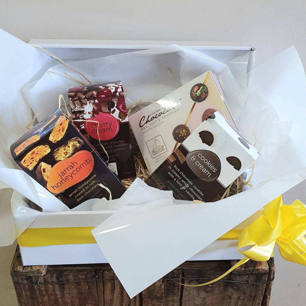 Gift-wrapped Chocolate Lovers cardboard box hamper by Hanging Basket Florist, available for delivery in Rockingham, Baldivis, and Warnbro.